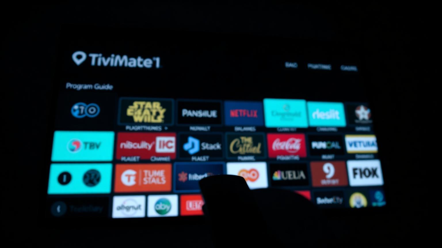 TV screen showing TiviMate's program guide EPG grid with channel logos in cyan glow, Fire TV remote in foreground